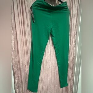 Green leggings  size medium NWT